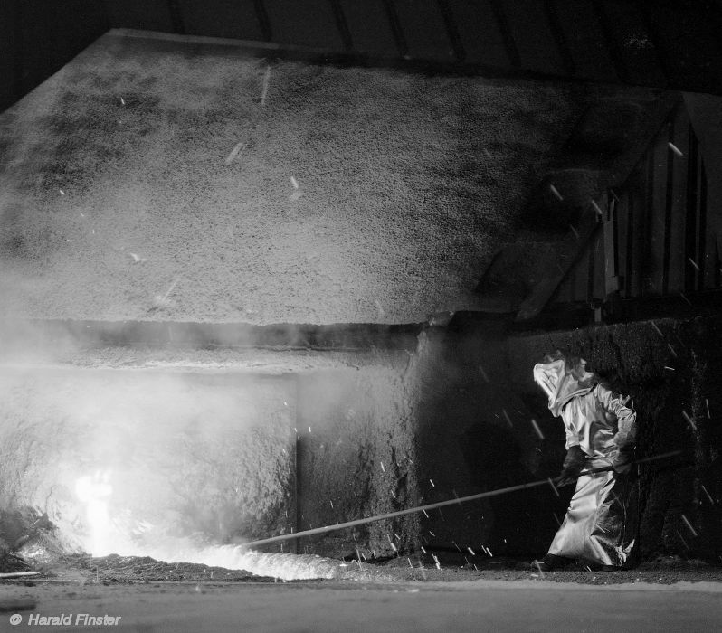 workers tapping the blast furnace